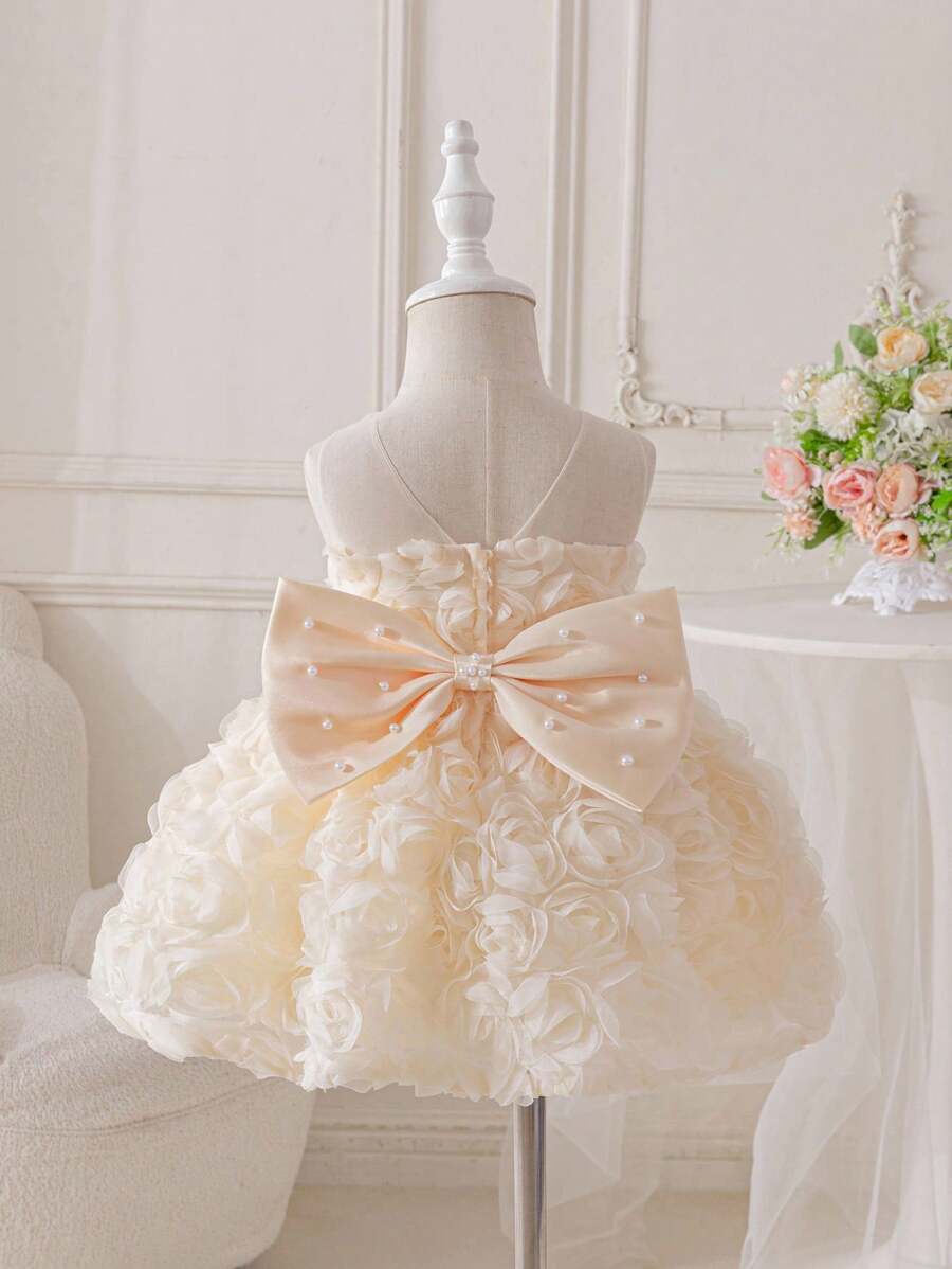 SHEIN Glamorique Kids Infant/Baby Girl Floral 3D Lace Tulle Satin Puff Sleeve Back Bow Pearls Decorated Party Dress, Wedding Flower Girl Gown For Birthday, Anniversary Baby Girl Dress Elegant Wedding Baby Bow Dress Baby Flower Girl Dress Toddler Flower Girl Dress Champagne Baby Dress Fall Winter - Champagne - View 1