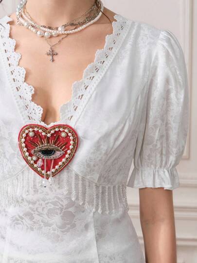EDITION Blusa con cuello en V, mangas abultadas, encaje y colgante con cristal y cuentas con diseño de corazón y ojo, estilo vintage palaciego para mujer