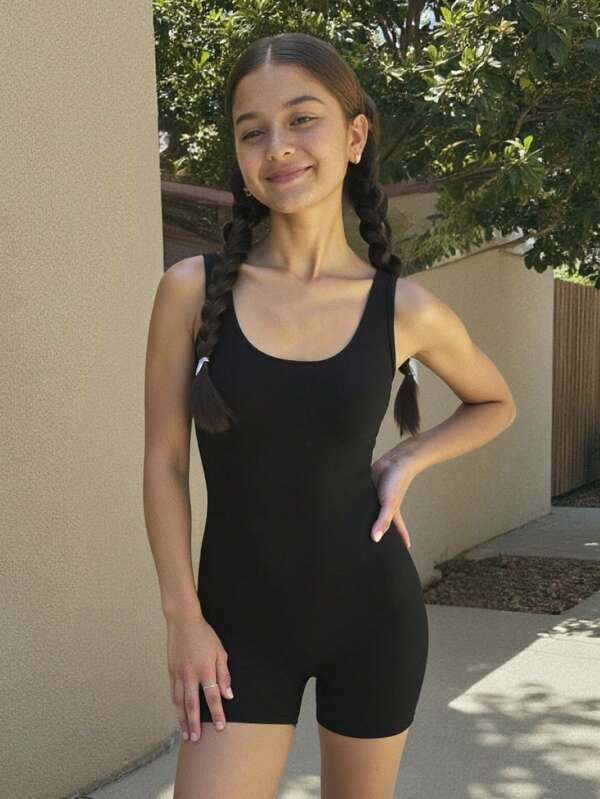 SHEIN Tween Girl Slim Fit Solid Black Casual Minimalist Comfortable Sleeveless Jumpsuit Romper Black Tween Girl Black Jumpsuit Black Bodysuit For Tweens