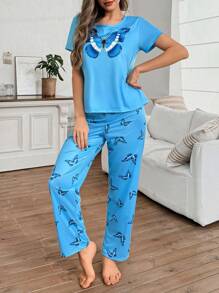 SHEIN Set de 2 piezas con Top de manga corta holgada y pantalones de pijama con estampado de mariposa