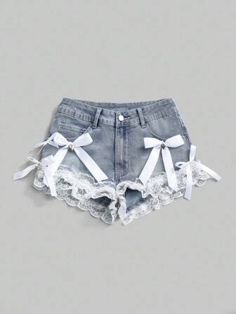 Grunge Punk Shorts in denim mini super vita bassa, sexy, con pendente a croce in pizzo e fiocco, adatti per l'estate, la spiaggia, la laurea, la Pasqua, i concerti, le vacanze a Nashville, nei colori blu scuro/nero