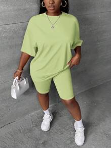 Slaydiva Women Solid Color Round Neck Short Sleeve Top And Shorts Casual Set