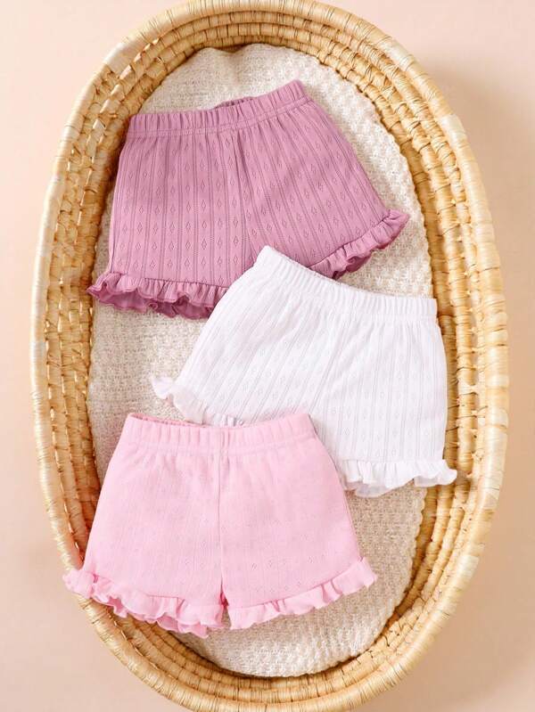 SHEIN 3pcs/Set Baby Girl Casual Loose & Comfortable Shorts Set, Stretchy Waist, Floral Hollow Out Knitted Fabric, Ruffle Hem, Pink & White Solid Colors, Multiple Options, High Cost-Effective, Suitable For Spring/Summer Casual Wear & Vacation