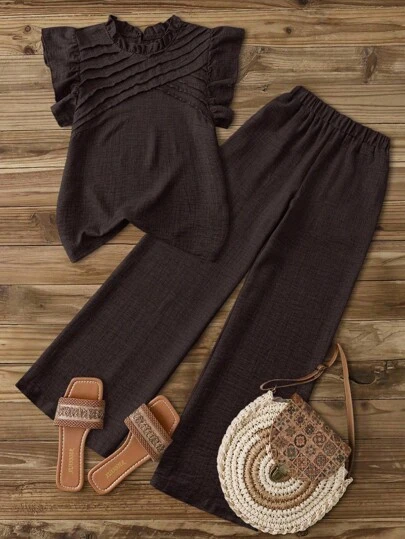 GlowEve 女士休闲蓝色不对称褶饰盖袖荷叶边领衬衫 + 女士休闲蓝色松紧腰侧双口袋直筒九分裤套装，春夏