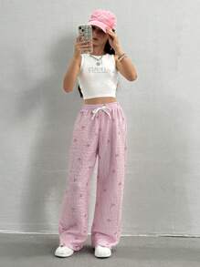 SHEIN WESTFADE Young Pantalon large blanc avec liens de contraste, taille avec bande texturée à bulles imprimée d'un nœud rayé rose pour jeune fille
