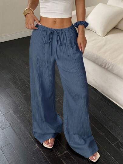Flirla Pantalones anchos sueltos de unicolor casual con cintura elástica y nudo para mujer