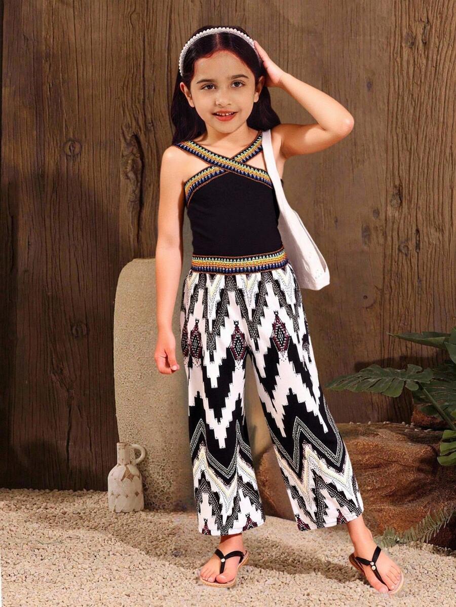 年轻女孩细肩带上衣和长裤 2 件套