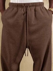 Quần thể thao nam SUMWON, màu đen, dáng rộng | Phong cách đường phố | Cần thiết cho INS | Thoải mái thường ngày | Phải có cho mùa lễ hội, chiếc quần thể thao dáng rộng màu đen này được làm từ chất liệu cao cấp, mang lại sự thoải mái và thoáng khí, hoàn hảo để phối cùng bất kỳ trang phục thể thao hoặc thường ngày nào. Thiết kế tối giản làm cho nó trở thành lựa chọn lý tưởng cho nhiều dịp khác nhau. Trơn - Màu nâu Sô-cô-la - Xem 7