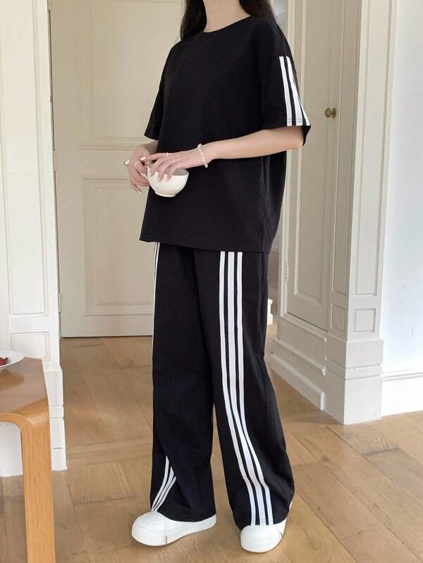SHEIN Mädchen Teens Basic einfarbiges schwarzes Strick-Rundhals Lässig lässiges Kurzarm T-Shirt mit Kontrastfarbe & lässige lange Hose, geeignet für Sport, Schule, Urlaub, College Stil, Ostern, Musikfestival, Graduation, Familientreffen, Frühling & Sommer