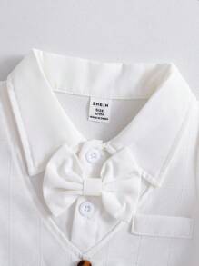 Souflis Souflis Set de 2 piezas para niño pequeño, camisa de manga corta con cuello vuelto y pantalones cortos a cuadros con parche