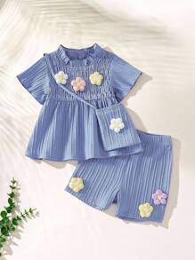 SHEIN Vintaside Kids Conjunto para bebé niña con decoración floral, camiseta de manga corta y pantalones cortos a la moda - Azul lavado oscuro - Ver 8