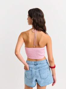 Nöista 柔美露背上衣，正面饰有大蝴蝶结和锁孔镂空设计。短款廓形，柔软纹理面料，完美契合温暖天气或层叠造型。大胆而不失优雅。 - 藕粉色 - 查看 6