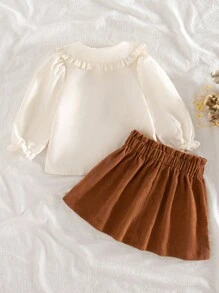 SHEIN Conjunto de 2 piezas de niña bebé con estilo vintage: Cárdigan de manga larga con cuello Peter Pan y volantes bordados, y falda de pana, para otoño/invierno - Multicolor - Ver 2