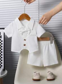 Souflis Souflis Set de 2 piezas para niño pequeño, camisa de manga corta con cuello vuelto y pantalones cortos a cuadros con parche