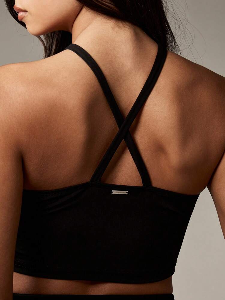 Missguided x Playboy Top corto con scollo a canottiera e incrocio di spalline, abbigliamento da festival e da discoteca estivo, senza maniche