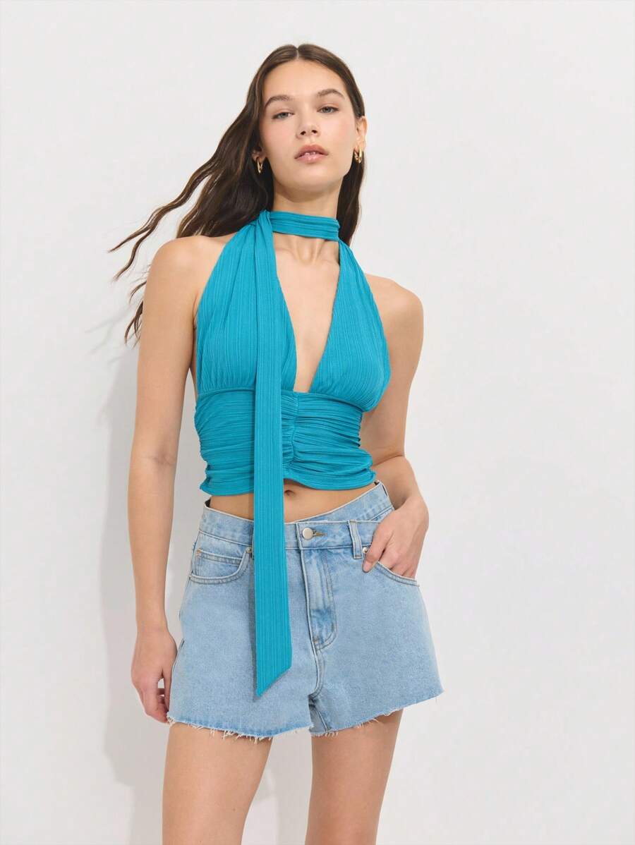 Nöista 露背短款上衣，采用纹理弹力面料，领口低开，腰部褶饰。无论是海滩派对、美国独立日派对还是夏日节日装扮，都是大胆之选！ - 藍色 - 查看 1