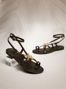SHUZIA Sandali piatti da donna comodi per tutti i giorni estivi, carini per vacanze e momenti casual, con decorazione a stella marina color oro