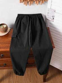 SHEIN Pantaloni da tuta ragazzi cargo con tasche, pantaloni jogger adatti per uso quotidiano, scuola, per tutte le stagioni