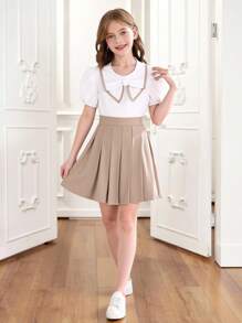 SHEIN Blouse Pour Fille Préadolescente À Manches Bouffantes Avec Garniture Contrastante Et Jupe Plissée