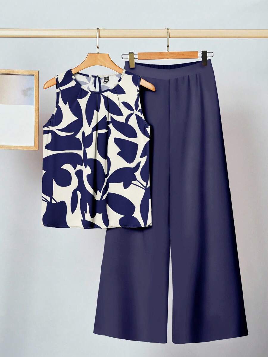 SHEIN Clasi 2 件套女士休闲优雅花卉图案上衣和短裤套装，适合夏季