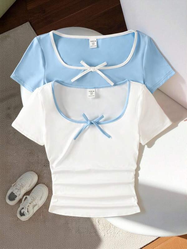 SHEIN Set de 2 camisetas de manga corta con cuello en U, decoradas con lazos, de estilo sencillo y cómodo de color block para niñas preadolescentes