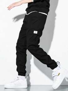 SHEIN Pantaloni da tuta ragazzi cargo con tasche, pantaloni jogger adatti per uso quotidiano, scuola, per tutte le stagioni