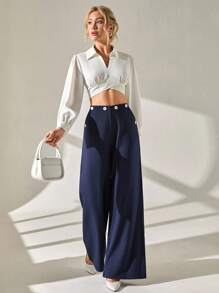 CLARA VERO Pantalones de pierna ancha estilo marinero, color azul marino, diseño de cintura alta, mezcla de algodón premium, uso formal de oficina, botones decorativos frontales, silueta de corte ancho, colección profesional, estilo marítimo clásico, ajuste regular, apropiado para negocios, diseño moderno de ropa de trabajo