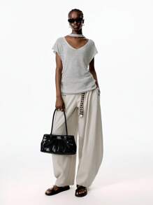 LYSMO 2025年夏季新品女款金属感低领无袖透视背心，不对称下摆，完美演绎前卫时尚 - 銀色 - 查看 7