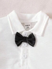 Souflis Souflis 2 件套男婴绅士装，包括带领结的连体衣和可调节吊带短裤，适合各种场合、派对、正式活动、婚礼、洗礼、典礼和生日庆祝活动，适合 1 个月至 2 岁的婴儿、婴儿连体衣、1 岁生日装、拍照装、夏季、儿童服装、幼儿服装、婴儿西式装、婴儿装、生日装、洗礼装、洗礼纯色 - 黑色 - 查看 3