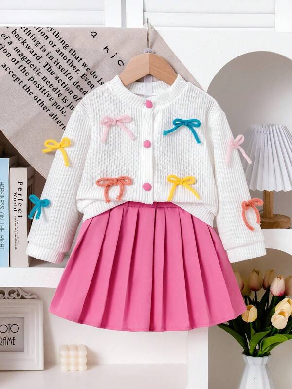 SHEIN Playful Pals 2 pièces Jeune fille Cardigan tricoté décontracté avec design 3D coloré en nœud, assorti avec jupe, convient pour décontracté, mignon, extérieur, automne/hiver