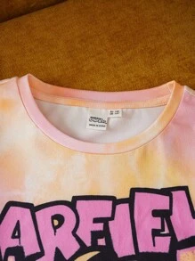 GARFIELD | SHEIN Ensemble 2 pièces de T-shirt style sport décontracté ample avec motif tie-dye et graffiti et shorts de cyclisme noirs pour jeune fille, adapté pour le printemps/été et les sports extérieurs
