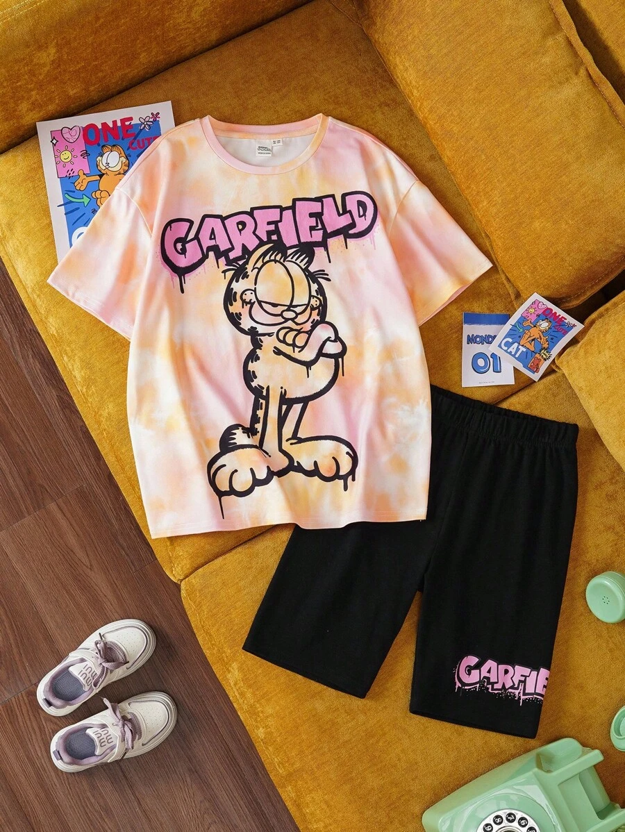 GARFIELD | SHEIN Ensemble 2 pièces de T-shirt style sport décontracté ample avec motif tie-dye et graffiti et shorts de cyclisme noirs pour jeune fille, adapté pour le printemps/été et les sports extérieurs