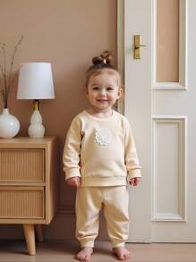 Souflis Souflis Baby Girl Fashion Simple Lace Badge Long Sleeve Round Neck Sweatshirt And Tie Waist Pants 2pcs Outfit Set, Suitable For Spring And Autumn, Daily Wear, Outings, College, Park, Playground Cream Baby Girl Outfit Baby Set Autumn Winter Season Toddler Cream Outfit - Apricot - View 7