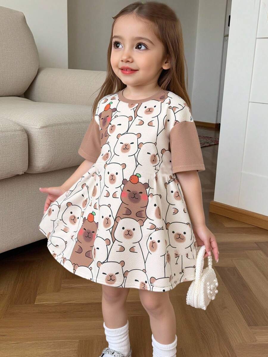 SHEIN Vestido casual de manga corta con cuello redondo, estampado de capibara, cómodo y suelto para niña joven - Caqui - Ver 1