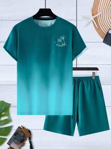 Manfinity RSRT Conjunto de camiseta de manga corta de cuello redondo y pantalón corto con cordón en la cintura con estampado de palmeras para hombre