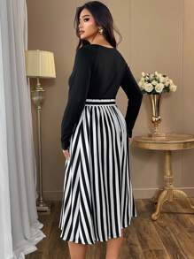 SHEIN Clasi Plus Size Women's Solid Color Comfortable Round Neck Long Sleeve T-Shirt With Women's Striped Print With Button Pocket Belt Design Waist Skirt Elegant Women's Two Pieces Set - Black and White - View 2