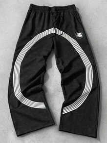 Manfinity Roghcode Pantalón de chándal para hombre con cintura con cordón, pierna acampanada y bolsillos, con diseño de rayas de copos de nieve - Negro - Ver 1