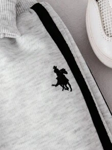 SHEIN Playful Pals 2 pezzi/confezione Bambino maschio Bambino Casual Dinosauro 3D Stampa Maglietta a maniche corte e pantaloncini Set a 2 pezzi, abbigliamento primavera/estate, età 0-3