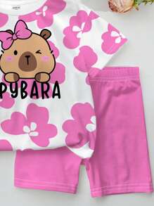 年轻女孩休闲卡通图案短袖短裤两件套，适合夏季