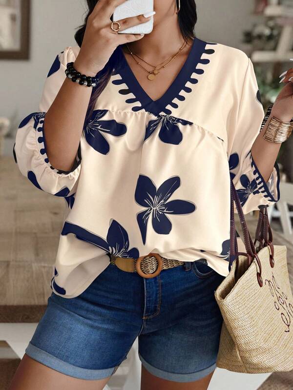 SHEIN PETITE CURVE Blusa de mujer de talla grande con estampado floral, cuello en V y mangas de farol, con corte floral irregular