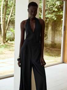 Lumivelle Women's Minimalist Halter Neck Solid Color Side Knot Wide Leg Jumpsuit - Black - View 6