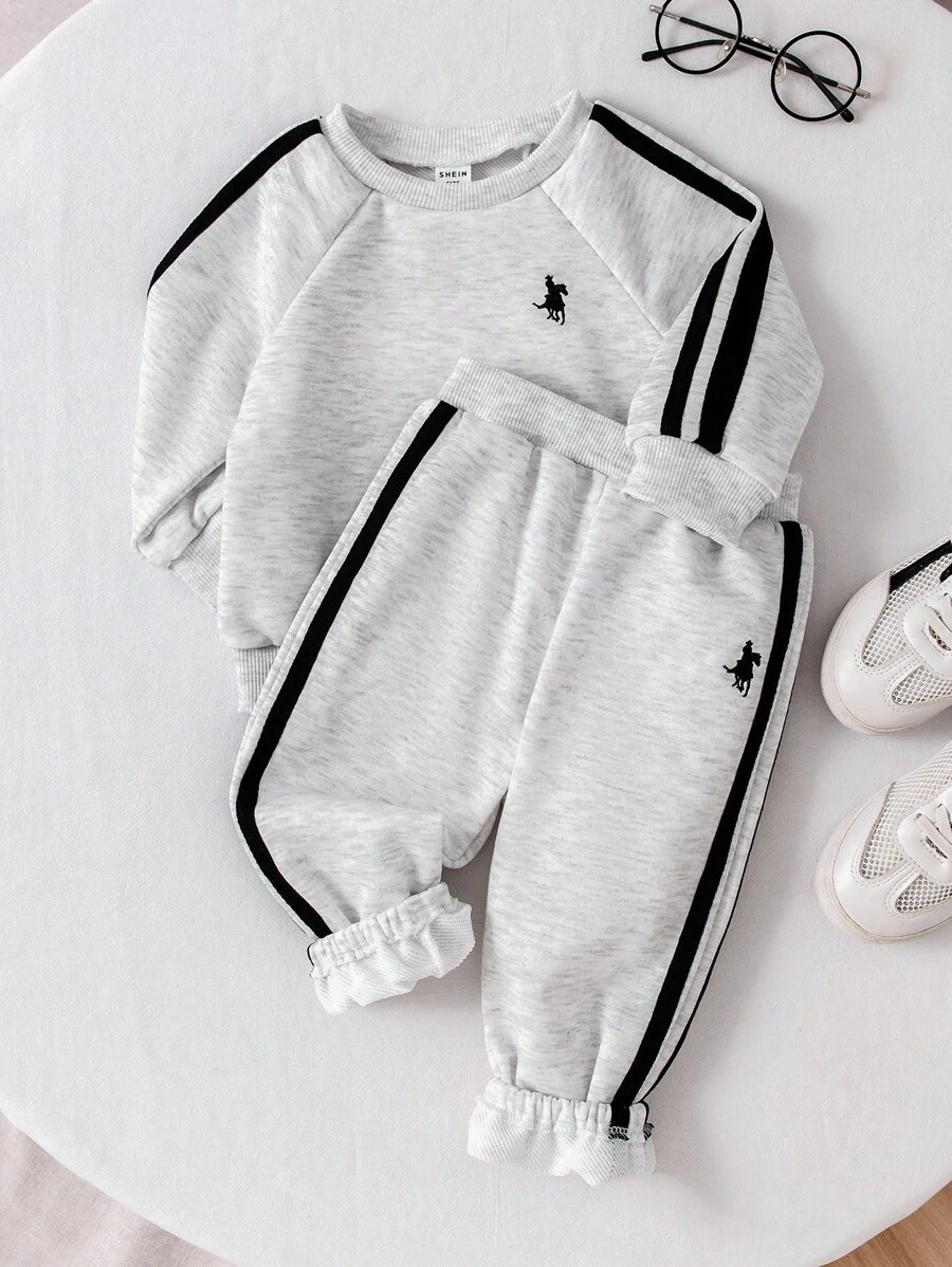 SHEIN Playful Pals 2 pezzi/confezione Bambino maschio Bambino Casual Dinosauro 3D Stampa Maglietta a maniche corte e pantaloncini Set a 2 pezzi, abbigliamento primavera/estate, età 0-3