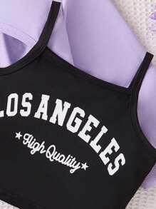 مجموعة 3 قطع للبنات (4-7 سنوات) أنيقة وجذابة: لباس علوي رياضي بلون المشمش مع تأثير دافئ ومتنوع ، فوق ملابس علوية أسود بسيط مطبوع عليه حرف LOSANGELES ، تنورة منسوجة بتفاصيل أنيقة وجميلة. يمكن ارتداء المجموعة بشكل منفصل أو مزجها لمظاهر مختلفة ، مناسبة للربيع والخريف والشتاء