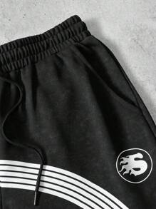 Manfinity Roghcode Pantalón de chándal para hombre con cintura con cordón, pierna acampanada y bolsillos, con diseño de rayas de copos de nieve - Negro - Ver 4