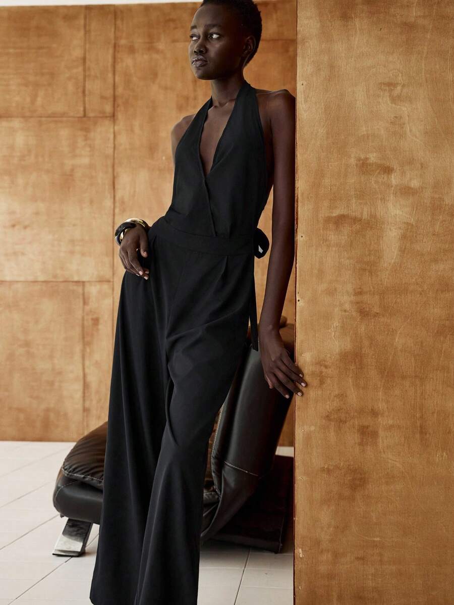 Lumivelle Women's Minimalist Halter Neck Solid Color Side Knot Wide Leg Jumpsuit - Black - View 1