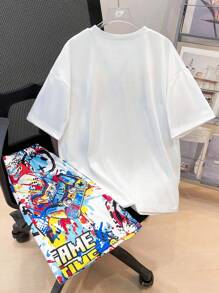 SHEIN Set de 2 piezas de camiseta de manga corta con gráfico de videojuego y pantalones cortos para niño preadolescente