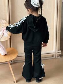 SHEIN 2pcs Young Girl Set: Hooded Sweatshirt With Ribbon & Bow Detail, And Sport Pants, Casual Cute Korean Style Young Girl Girls' Round Neck Knitted Sweaters Set, Fall Back To School Clothes Fall Clothes For Kids Winter Clothes - Black - View 2