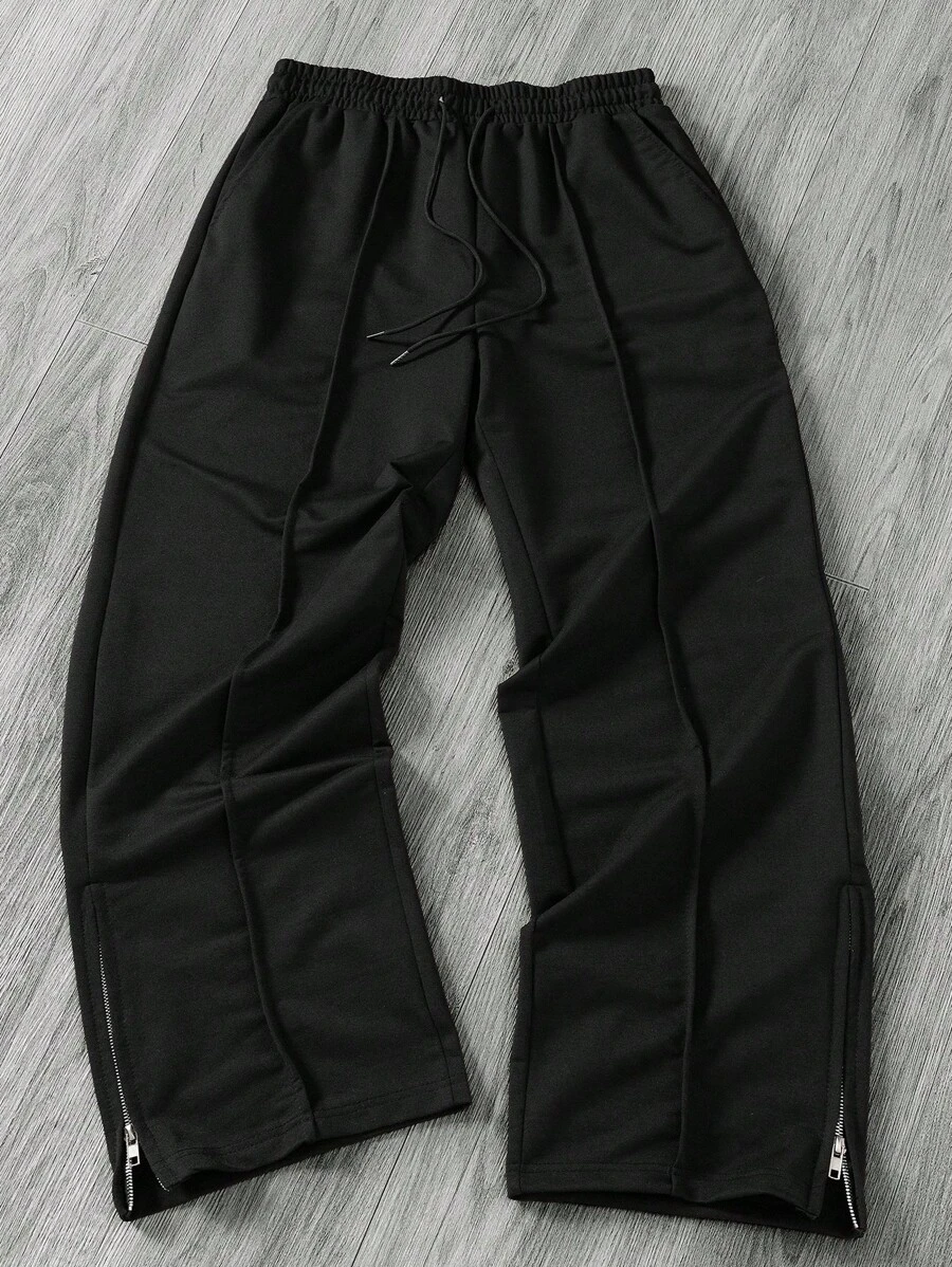 Manfinity EMRG Quần nỉ nam màu trơn có dây rút ở eo họa tiết tăm Thiết kế khóa kéo bên hông thường ngày - màu đen - Xem 1