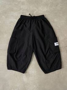 SHEIN Tween Boys Spring/Summer Dual Pocket Pants Straight Leg Drawstring Cargo Plain Black,Capri Pants, Modify Leg Shape, Tapered Cuffs - Black - View 1