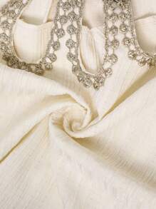 Al Najma Elegant Yellow Modest Abaya Dress For Women, Featuring A Unique Round Neckline With Pearl Beaded Cut-Out Details. This Long Sleeve Woven Fabric Gown, With Its Semi-Sheer And Subtle Rib-Knit Texture, Offers Grace And Style. Kaftan Jalabiya Dress - Yellow - View 8